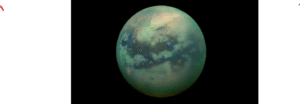 Titan, Saturn's largest moon, photographed by NASA's Cassini spacecraft showing its thick hydrocarbon atmosphere and surface lakes