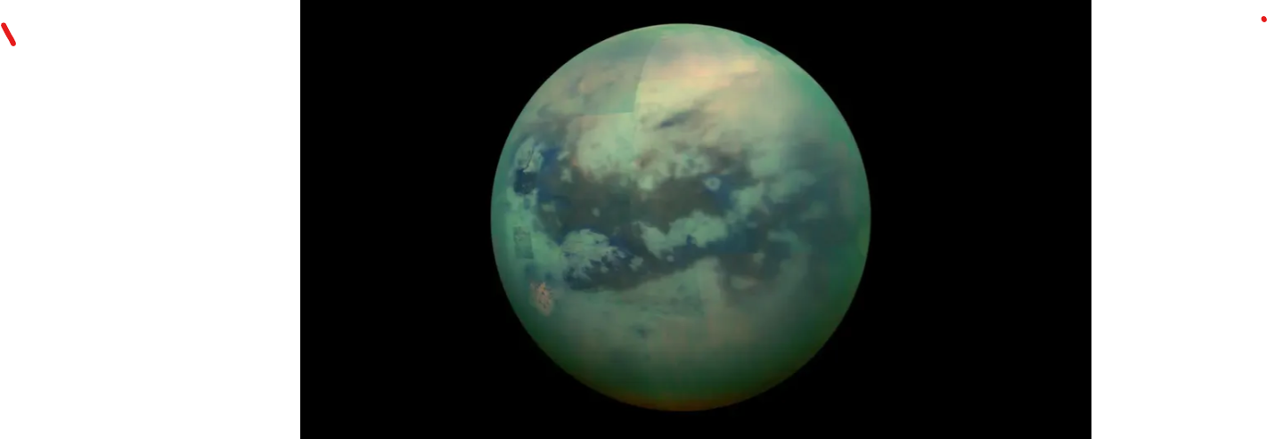 Titan, Saturn's largest moon, photographed by NASA's Cassini spacecraft showing its thick hydrocarbon atmosphere and surface lakes